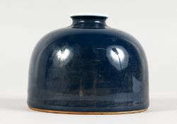 A DARK BLUE GROUND CHINESE PORCELAIN BRUSH POT. 4ins diameter.