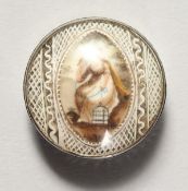 A SMALL GEORGIAN SILVER CIRCULAR PILL BOX with enamel top. 1ins diameter.