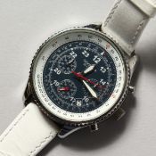 A GENTLEMAN'S SEKONDA WRISTWATCH with three dials, leather strap and original box.