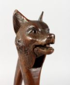 A VERY GOOD BLACK FOREST CARVED WOOD FOX HEAD NUT CRACKERS with glass eyes. 8ins long.