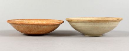 TWO EARLY CHINESE TERRACOTTA BOWLS.