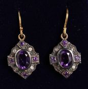 A PAIR OF 9CT GOLD AND SILVER AMETHYST AND DIAMOND EARRINGS.