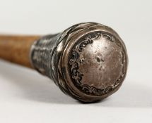 A SILVER HANDLED WHIP. 37ins long.