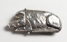 A SILVER PIG VESTA.