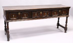 A GOOD 18TH CENTURY OAK DRESSER, with a twin plank top, three drawers each with a pair of