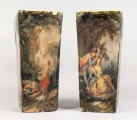 A PAIR OF CONTINENTAL POTTERY PEDESTAL STANDS, of tapering square shape, decorated with classical
