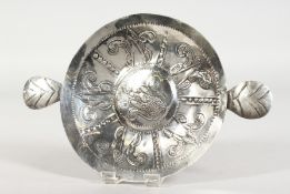 A CHARLES II SILVER TWO HANDLED SWEETMEAT DISH with hammered decoration. Circa 1660. 5.5ins
