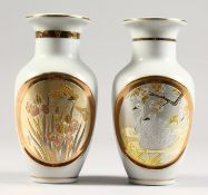 A PAIR OF JAPANESE DESIGN VASES. 6ins high.