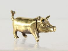A BRASS PIG SHAPE VESTA CASE.
