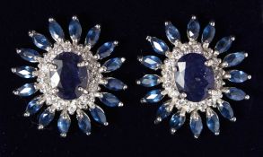 A GOOD PAIR OF SILVER AND SAPPHIRE CLUSTER EARRINGS.