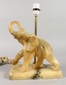 ANALABASTER ELEPHANT TABLE LAMP. 9ins long.