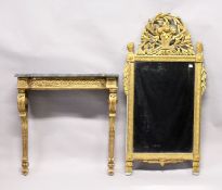 AN 18TH CENTURY ITALIAN GILTWOOD CONSOLE AND MIRROR, the mirror with pierced frieze basket and