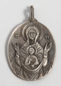 A RUSSIAN SILVER OVAL SHAPED ICON PENDANT. 2ins long.