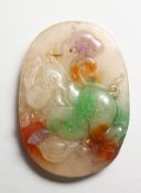AN UNUSUAL CHINESE MULTI COLOURED CARVED JADE PENDANT. 2.25ins.