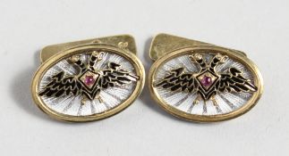 A PAIR OF RUSSIAN SILVER AND ENAMEL DECORATED CUFFLINKS.
