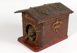 A VERY GOOD BLACK FOREST CARVED WOOD DOG IN A KENNEL BOX, the roof opens to reveal a box, the dog