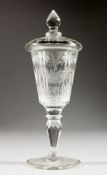 AN ENGRAVED GOBLET AND COVER. 8.5ins high.