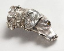 A CAST NOVELTY SILVER HOUND'S HEAD VESTA.