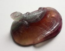 A GOOD CARVED AGATE LIZARD DESK WEIGHT. 4ins long.