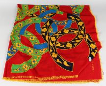 A VINTAGE CHANEL SILK SCARF, RED AND BLUE WITH FLOWER HEADS.