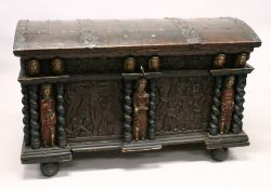 A LARGE AND IMPRESSIVE CONTINENTAL STAINED PINE DOME TOP COFFER, initialled and dated 1700, the