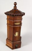 A LARGE GEORGIAN STYLE MAHOGANY OCTAGONAL POST BOX with letter box, opening front and small drawer