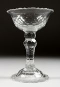 A GEORGIAN CUT GLASS COMPORT. 6.5ins high.