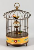 A SMALL BIRDCAGE AUTOMATON CLOCK. 8ins high.