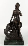 A CLASSICAL STYLE BRONZE GROUP of a semi-nude female figure, seated on a tethered goat, mounted on a