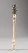 A 19TH CENTURY FRENCH IVORY AND SILVER FILIGREE POSY HOLDER. 8ins high.