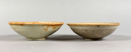 TWO EARLY CHINESE TERRACOTTA BOWLS.