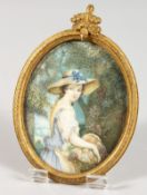 EARLY 19TH CENTURY FRENCH SCHOOL. Portrait miniature of a lady in a large hat carrying a basket of