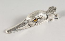 A PLATED DUCK HEAD PAPER CLIP with glass eyes.