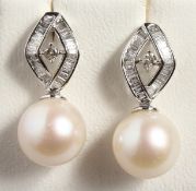 A PAIR OF 18CT WHITE GOLD, PEARL AND DIAMOND EARRINGS.