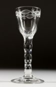 A GEORGIAN WINE GLASS with engraved bowl and cut stem. 5.75ins high.