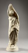 A PARIAN PORCELAIN FIGURE OF A CLASSICAL LADY on a circular base. 16ins high.