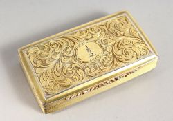 A VICTORIAN SILVER GILT SNUFF BOX engraved with scrolls, with crest. Birmingham 1840. Maker F. C.