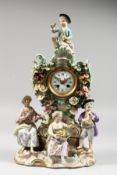 A SUPERB 19TH CENTURY MEISSEN PORCELAIN CLOCK encrusted with flowers and four figures and scrolls in