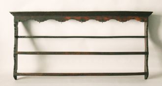 AN 18TH CENTURY OAK TRIPLE DELFT RACK, with moulded cornice and wrought iron hooks. 5ft 8ins long