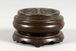 A SMALL JAPANESE CIRCULAR CENSER ON STAND. 2.75ins diameter.