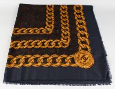A VINTAGE CHANEL SILK SCARF, BLUE PAISLEY WITH GOLD CHAIN.