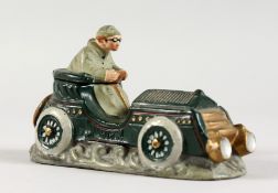 A RARE SPELTER MOTORING INKWELL, CIRCA 1910. 5ins long.