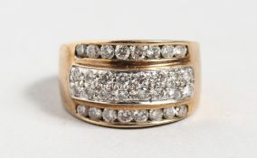 A 9CT YELLOW GOLD DIAMOND TRIPLE ROW RING.