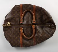 A LOUIS VUITTON LEATHER BAG.