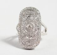 AN 18CT WHITE GOLD DECO DESIGN DIAMOND RING.