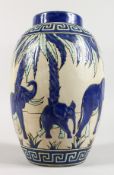 A LARGE ART DECO DESIGN POTTERY ELEPHANT VASE. 11.5ins high.