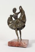 A SMALL AUSTRIAN BRONZE GIRL in a flapper dress, on a square marble base. 6ins high.