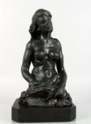 A BRONZE HALF LENGTH FIGURE OF A FEMALE NUDE, mounted on a marble base. 14.5ins high.