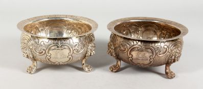AN EARLY PAIR OF 19TH CENTURY SILVER CIRCULAR BOWLS, POSSIBLY JAMAICAN, repousse decoration with