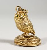 A GILDED OWL SEAL.